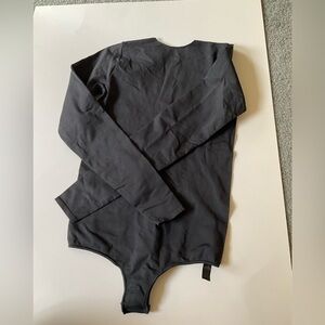 SKIMS essential bodysuit crew neck long sleeve body suit